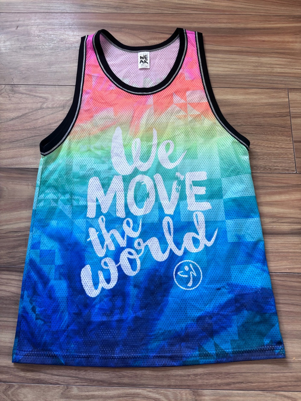 Zumba tank top XS with blue, green, and pink tie-dye and white 'MOVE THE WORLD'